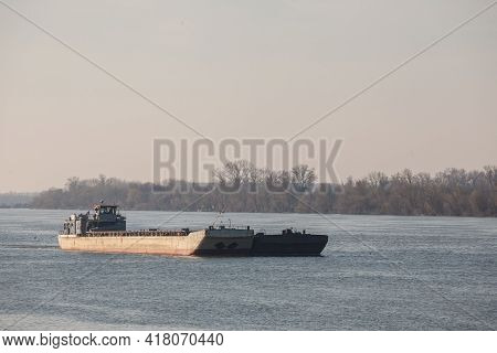Cargo Ship, A Barge, Cruising On The Danube River In Belgrade, Serbia, In Belgrade, Carrying Constru