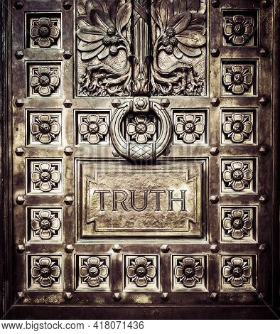 Door To The Truth Emblazoned In Bronze And Gold