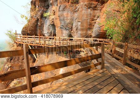 Retro Wooden Walk Way At The Rock Ciff  At Wat Pu Gon Buengkan Thailand