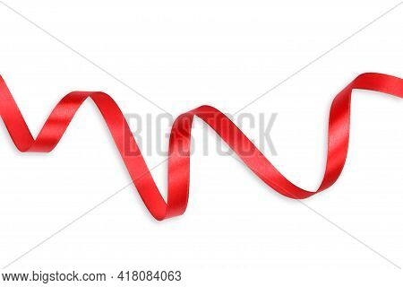 Clipping Path. Top View Of Rolled Shiny Red Ribbon On White Background View. Flat Lay Crative Idea D