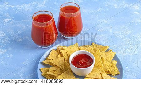 Traditional Mexican Cuisine: Nachos, Corn Tortilla Chips With Spicy Sauce And Alcoholic Drink Michel