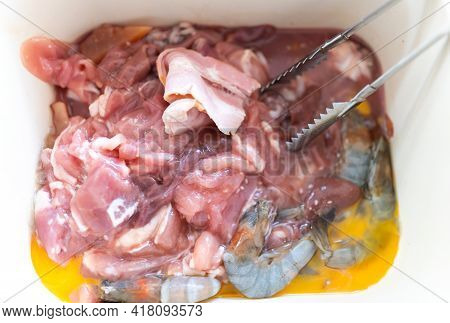 Close Up Of Thai Barbecue Buffet Pork Meat And Seafood On The Hot Pan, Moo Ka Ta