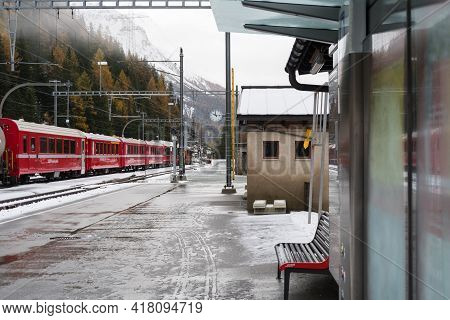 Cavaglia, Switzerland-november 2, 2018:snow-covered Trainstation Of Cavaglia Along The Way Of The Re