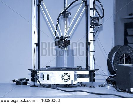 Modern 3d Printer Printing Figure Close-up. Automatic Three Dimensiona
