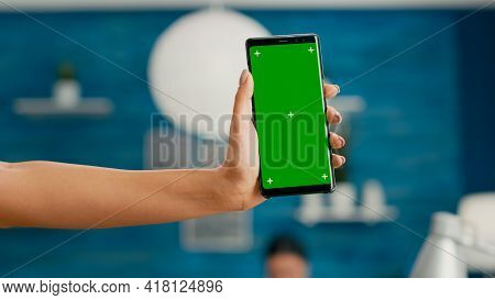 Hands Of Freelencer Holding Vertical Mock Up Green Screen Chroma Key Smartphone