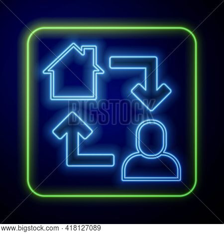 Glowing Neon Online Working Icon Isolated On Blue Background. Freelancer Man Working On Laptop At Hi