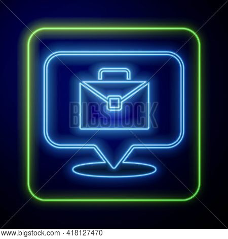 Glowing Neon Online Working Icon Isolated On Blue Background. Freelancer Man Working On Laptop At Hi