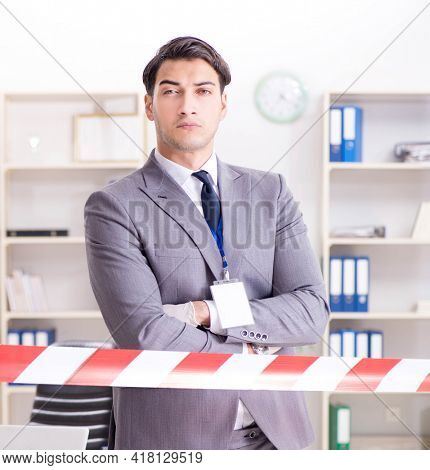 Forensics investigator at the scene of office crime