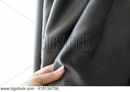 Womans Hand Touching Curtain, Gray Blackout Fabric, Light-blocking Fabric