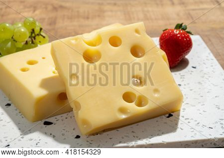 Cheese Collection, Blocks Of French Emmentaler Cheese With Many Round Holes Made From Cow Milk