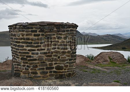 Sillustani Tombs In The Peruvian Andes Near Town Puno, Peru.\nan Inca Burial Tower At The Sillustani