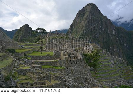 Machu Picchu  - The Lost City Of The Incas, Peru.
Mt Huayna Picchu (waynapicchy) Is At The Backgroun