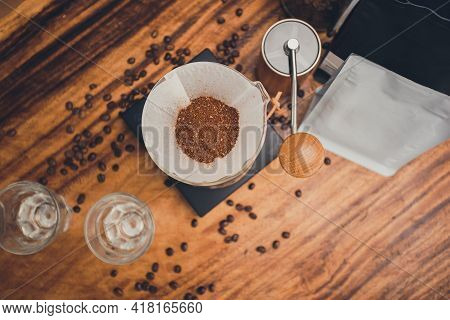 Top View Coffee Powder In The Dripper For Make Coffee Filter On Scales. Prepare Drip Coffee With Cof