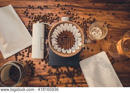 Top View Coffee Powder In The Dripper For Make Coffee Filter On Scales. Prepare Drip Coffee With Cof