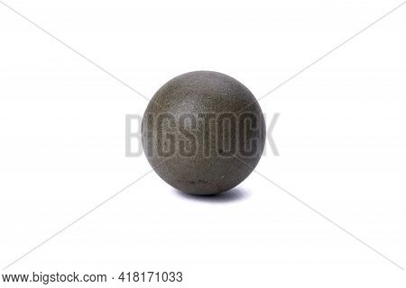 Gray Trackball With Cracks And Scratches On The Surface, Photographed Against A White Background Clo