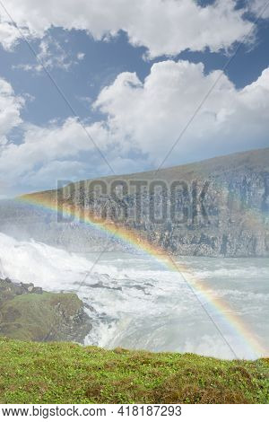 Iceland, Gullfoss Waterfall. Captivating Scene With Rainbow Of Gullfoss Waterfall