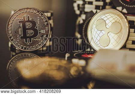 Btc Bitcoin And Xrp Ripple Coins Between Casino Chips. Entertainment And Modern Blockchain Payments 