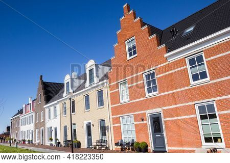 Row Of Houses In Old Dutch Style In Blauwestad, Netherlands