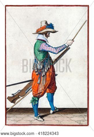 A soldier, full-length, to the right, holding a musket , with his left hand by his left thigh and sliding the ramrod in the holder under the barrel with his right hand. In his left hand