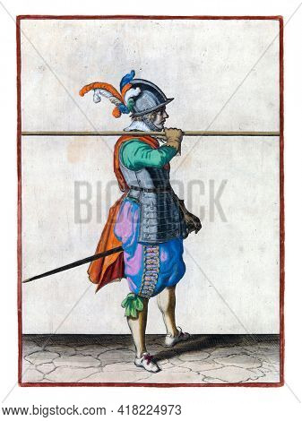 A soldier, full-length, to the right, carrying a spear (lance) horizontally on his right shoulder. His right hand on the skewer. This is the third act of lifting the skewer to the shoulder