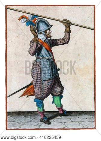 A soldier, full-length, to the right, lifting a spear (lance) with his left hand above his left shoulder, his right hand raised to take it over.
