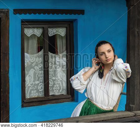 Salaj, Transylvania, Romania-may 14, 2018: Beautiful Young Girl In Traditional Romanian Folk Costume