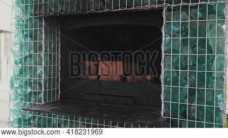 Outdoor Wood-burning Stove For Relaxing Family Or Hosting Guests With Wood, And Beautiful Stones