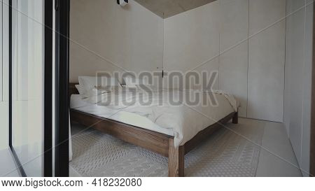 Bedroom Interior, Large Double Bed, In White And Gray, In A Modern Style