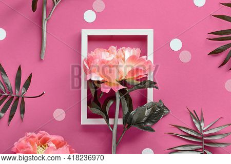 Pink Peony In White Frame, Palm Leaves. Creative Flat Lay On Abstract Geometric Background With Fram