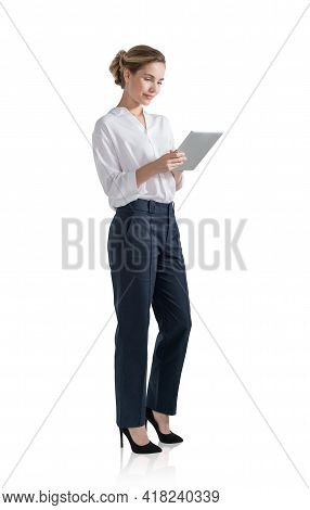 Office Blonde Woman In White Shirt, Business Clothes, Using Tablet In Hands, Smiling. Concept Of Bus