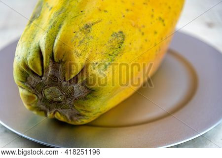 Formosa Variety Papaya Fruit On Wooden Background