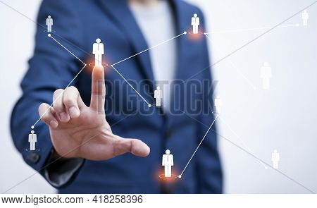 Businessman Holding Hr Human ,people Icon On The Graph Screen Of A Media Screen, Technology Process 