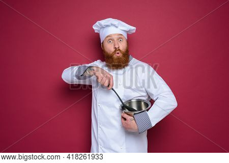 Chef Is Surprised About A New Recipe. Burgundy Background