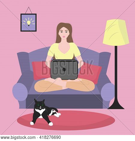 Work At Home Concept Design. Freelance Woman Working On Laptop On The Sofa, Dressed In Home Clothes.