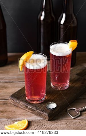 Grapefruit Or Cherry Radler, Citrus Beer Cocktail. Refreshing Fruit Beer Drink On Dark Table, Copy S