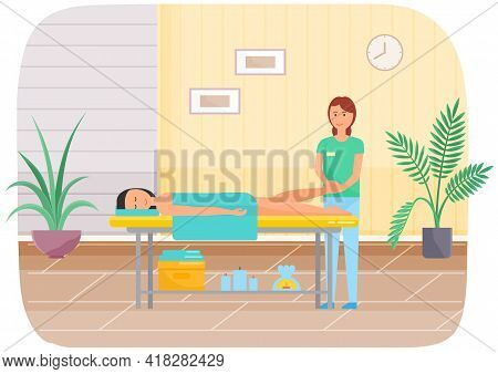 Masseur Is Massaging Legs Of Patient. Therapist Gives Massage To Young Woman Lying On Couch. Girl To