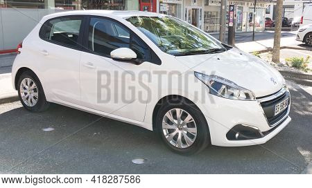 Bordeaux , Aquitaine France - 04 22 2021 : Peugeot 208 White Car New Modern French Vehicle Parked In