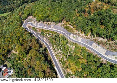 Winding Road Serpentine From A High Mountain Pass In The Rhine Village Bendorf Sayn Germany Aerial V