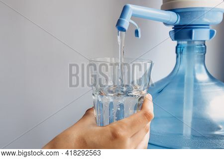 Concept Drinking Water, Water Glass In Hand.