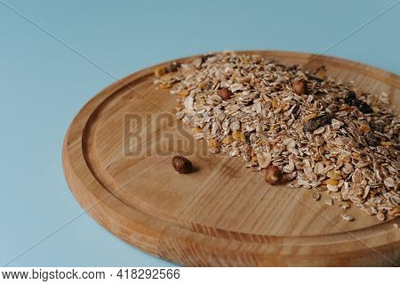 Homemade Muesli With Oats, Nuts And Seeds Close Up. Healthy Breakfast Concept.