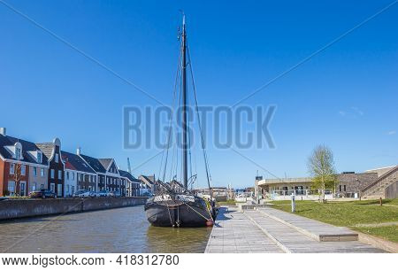 Blauwestad, Netherlands - April 24, 2021: Old Ship In The Canal Of Blauwestad, Netherlands