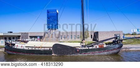 Blauwestad, Netherlands - April 24, 2021: Panorama Of An Old Wooden Sailing Ship In The Harbor Of Bl