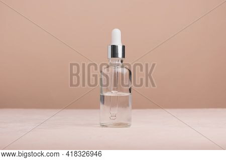 Eco Mineral Oil In Amber Glass Bottles With Pipette. Transparent Hyaluronic Serum Gel And Skin Care
