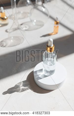 Eco Mineral Oil In Glass Bottles With Pipette Dropper. Transparent Hyaluronic Serum Gel And Skin Car