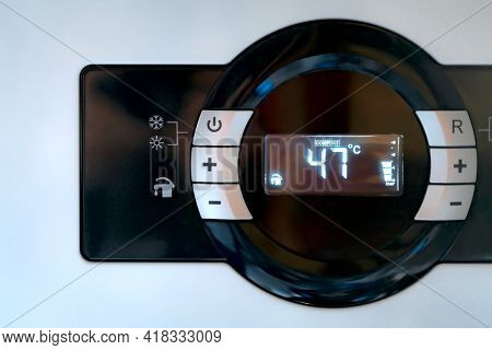 Front Panel Of Gas Combi Boiler With 47 Celsius And Comfort Sign On The Display. Home. Gas. Heater. 