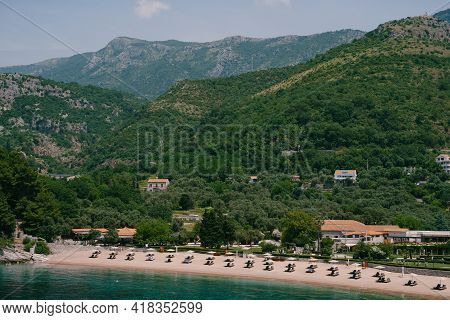 Sun Loungers Sit On The Sand Of The Royal Beach In Przno. View From Above