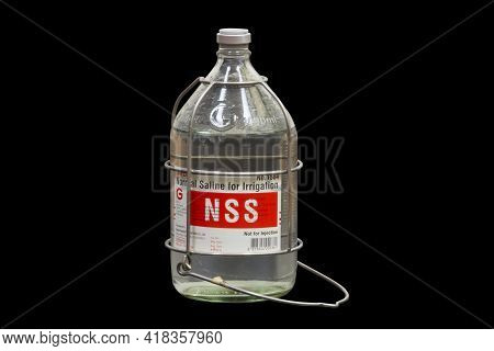 Bangkok, Thailand - Feb 14, 2017: Normal Saline 0.9% In Plastic 100 Ml Pour Bottles Are Seen On A Sh