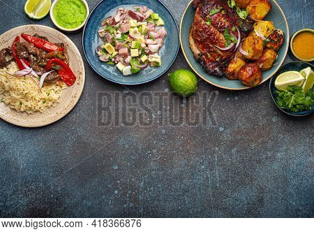 Assorted Dishes Of Peruvian Cuisine: Beef And Peppers Lomo Saltado, Peruvian Ceviche With Fish And S