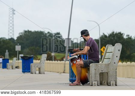 New Orleans, La - October 9: Man Practices On Conga Drum On Lakefront On October 9, 2020 In New Orle