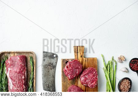 Fresh Raw Beef Steak Mignon Whole Cut Set, On White Stone  Background, Top View Flat Lay, With Copy 